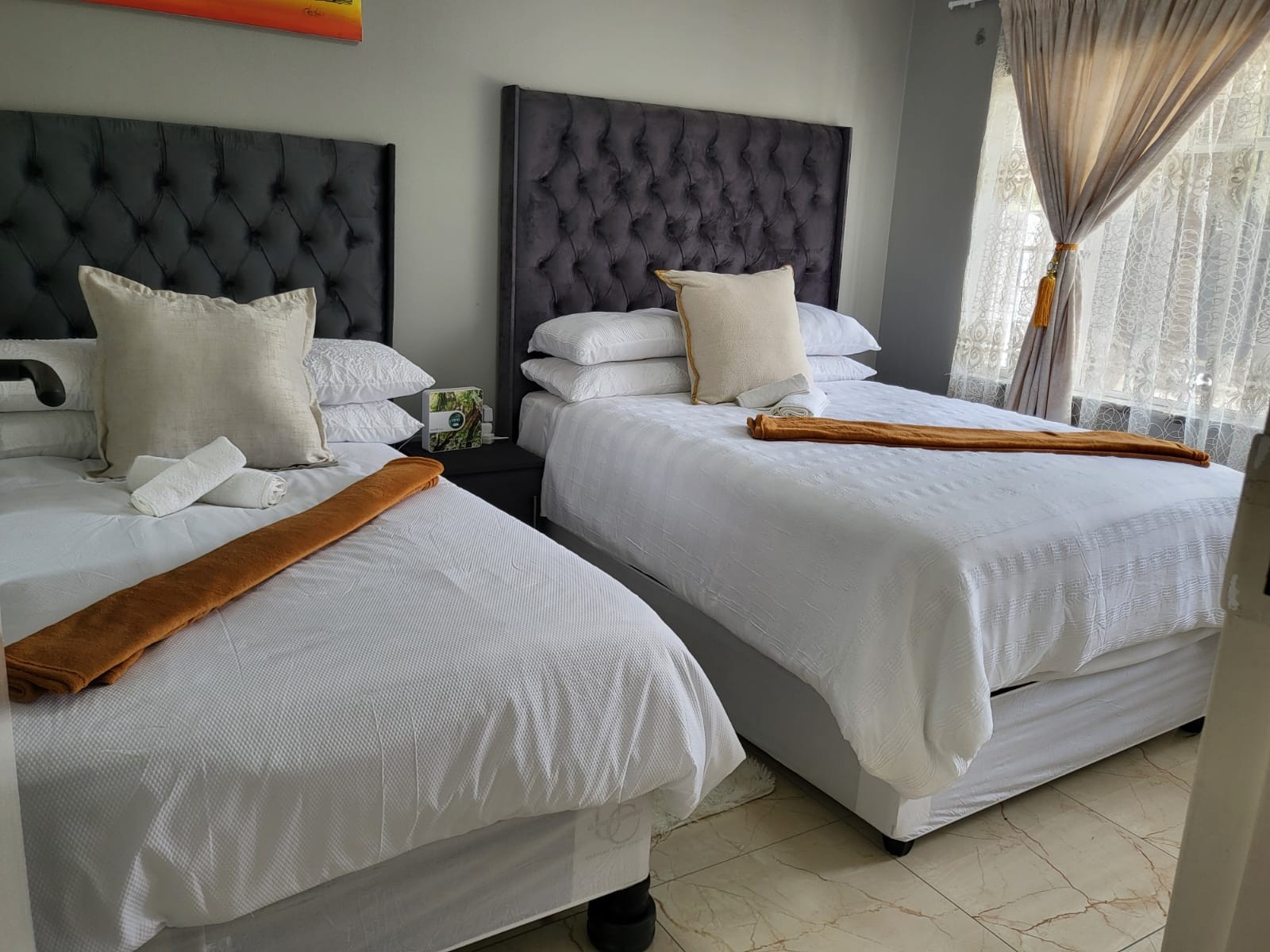 Room 2 with a double bed and single bed